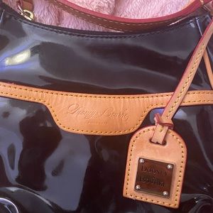 Dooney and Burke patent leather shoulder bag